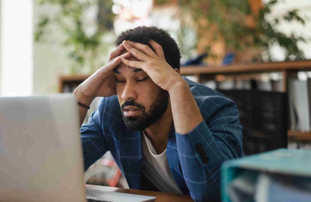 young-frustrated-man-sitting-in-front-of-computer